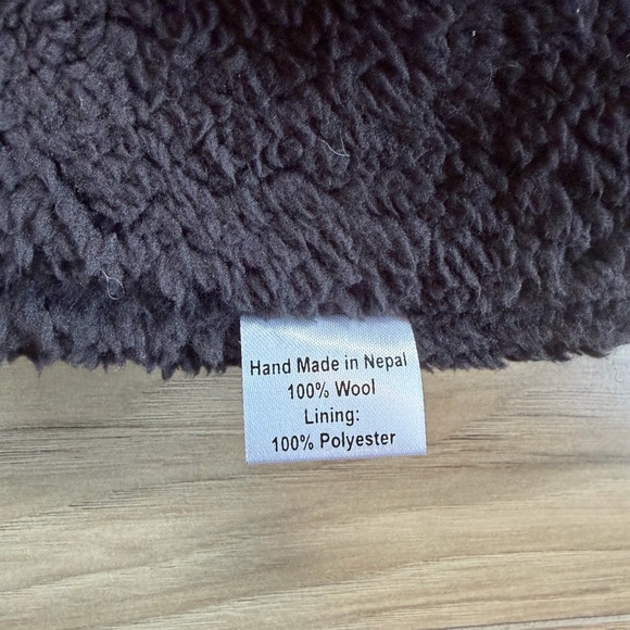 100% Wool outer. Handcrafted in Nepal. Earflap Embroidered Beanie - Black Floral - Picture 5 of 5